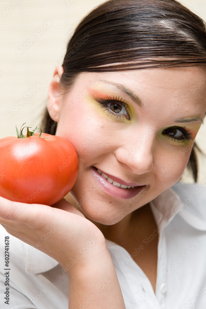 attractive brunette woman holding vegetable attractive brunette woman holding vegetable