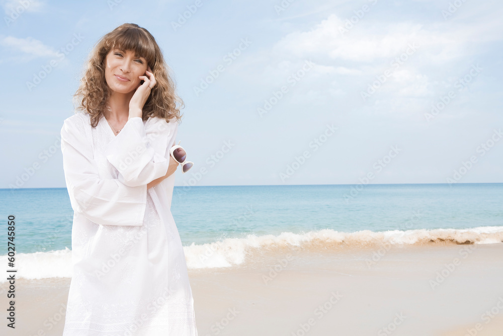Portrait of nice young woman having good time on the beach Portrait of nice young woman having good time on the beach