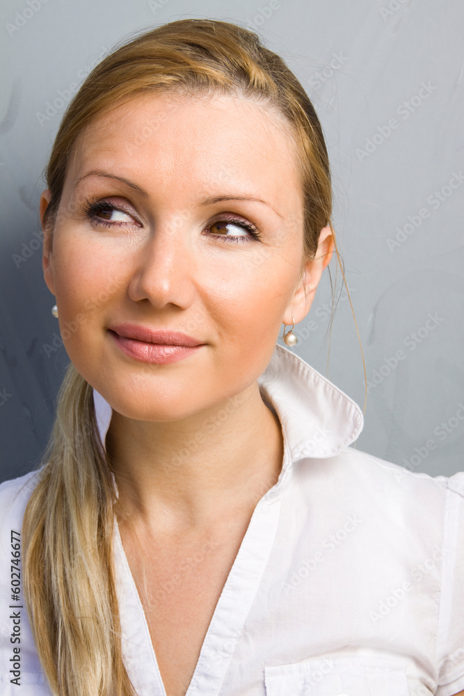 Portrait of young beautiful happy thinking woman Portrait of young beautiful happy thinking woman