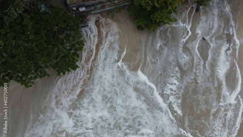 Orla e ondas da praia de Maresias em São Sebastião captada do alto por um drone em um dia de 2023.  photo