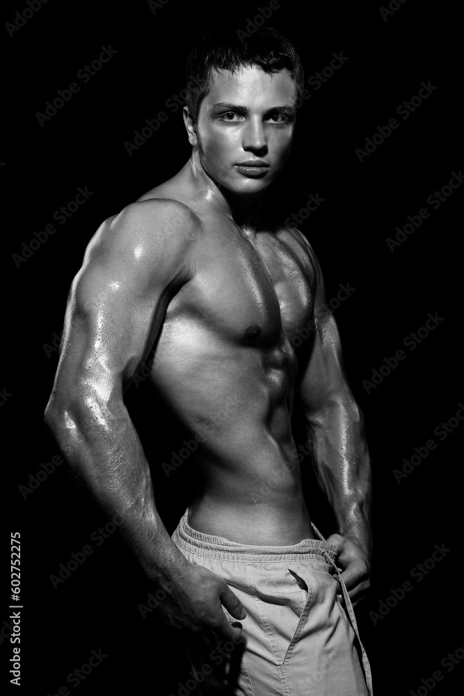 Young sports guy with a naked torso Young sports guy with a naked torso