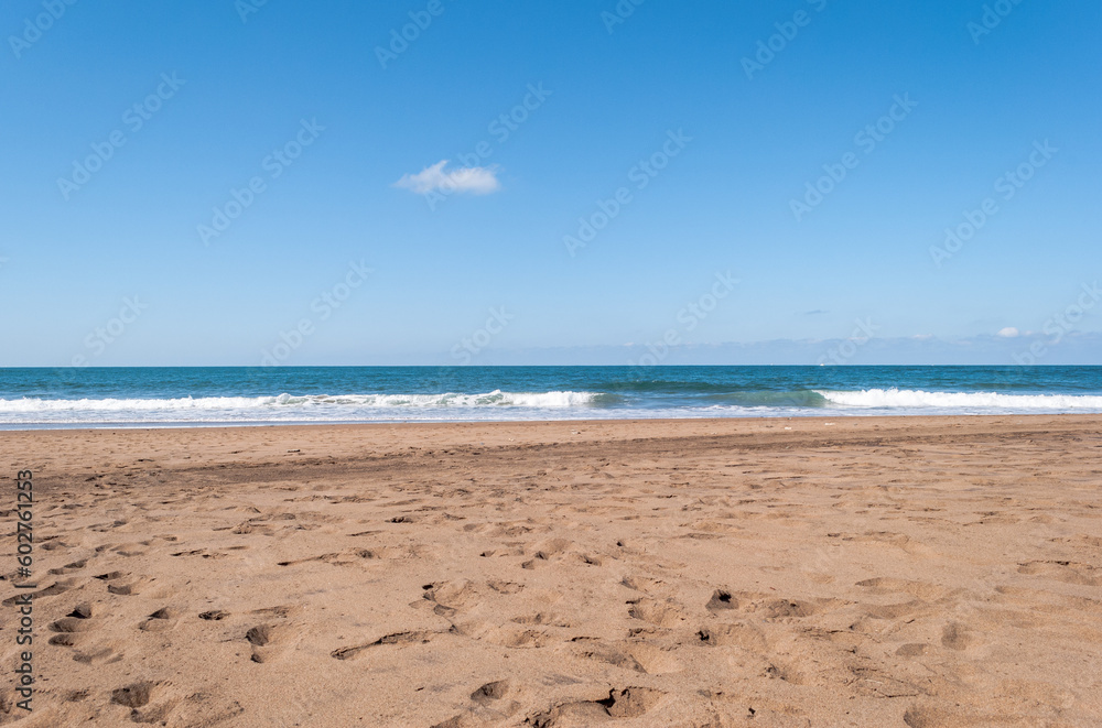 Sopelana beach near Bilbao. Day of relaxation and tranquility with little wind and incredible colors. Contrast with the golden sand and the blue of the ocean. Sopelana beach near Bilbao. Day of relaxation and tranquility with little wind and incredible colors. Contrast with the golden sand and the blue of the ocean.