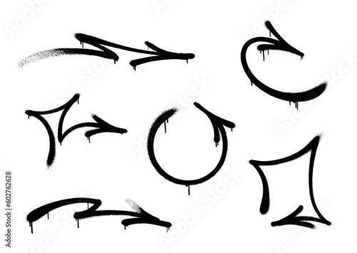 Graffiti arrow with overspray in black over white. Vector graffiti image