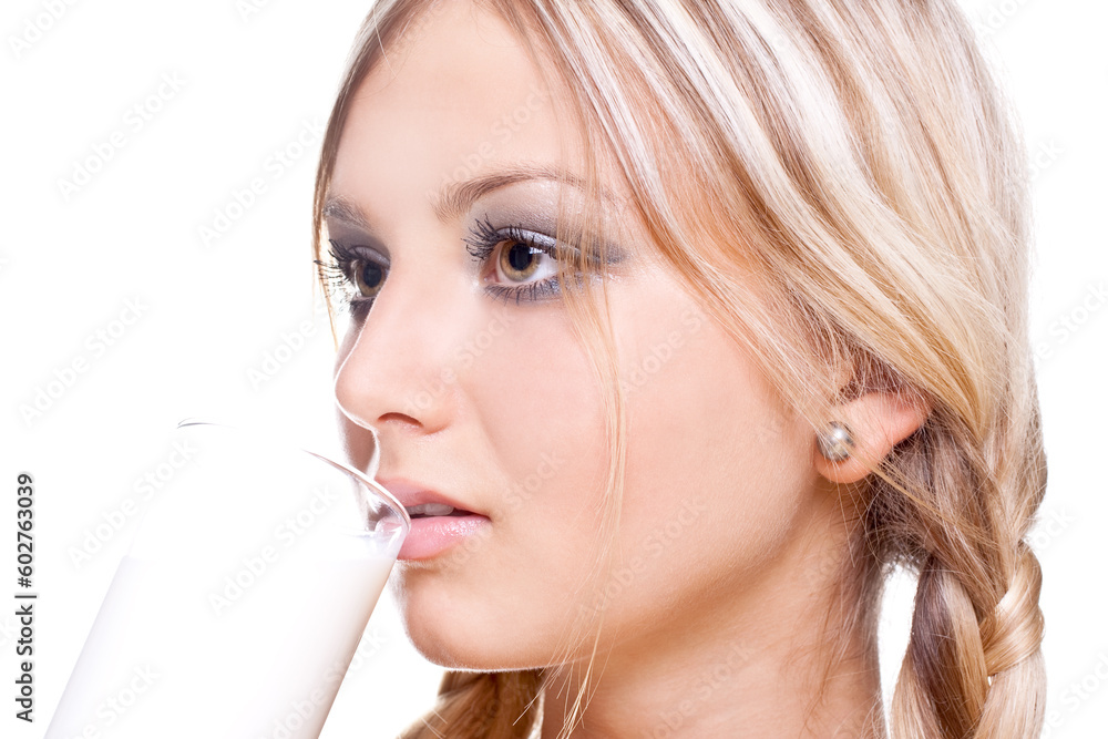 beautiful woman drinking milk on a white background beautiful woman drinking milk on a white background