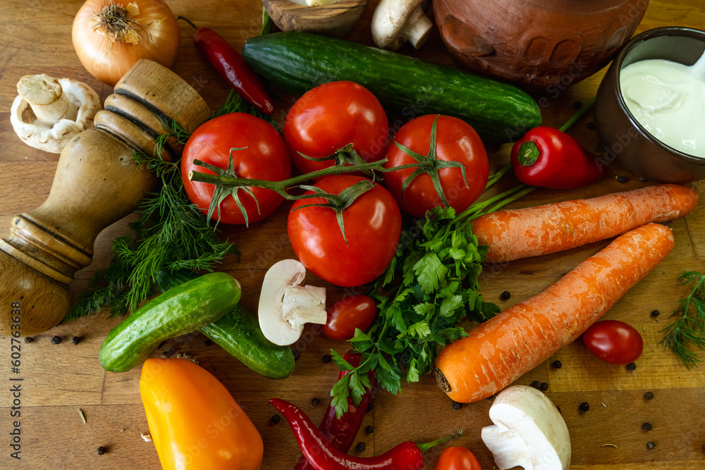 Fresh vegetables on a wooden table. Healthy food concept. Selective focus.