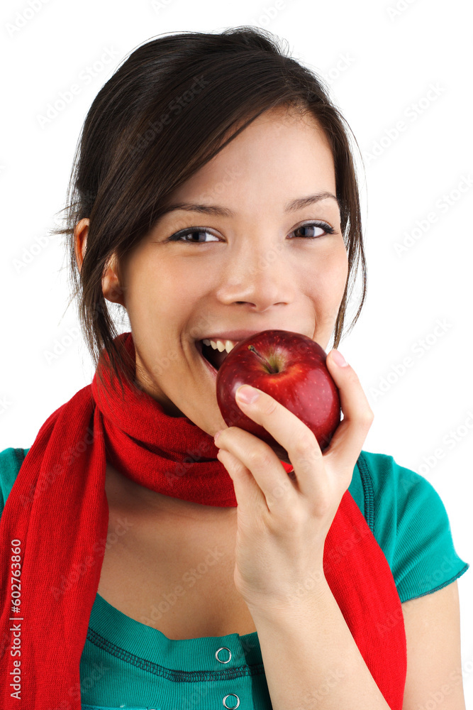 Beautiful autumn woman eating a red apple. Isolated on white background. Beautiful autumn woman eating a red apple. Isolated on white background.