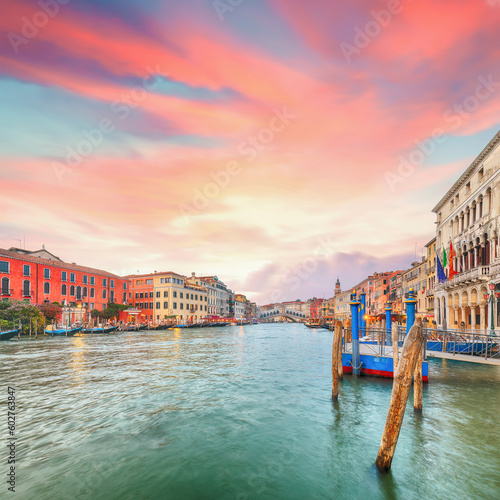 Stunning sunset and evening cityscape of Venice with famous Canal Grande and Rialto Bridge