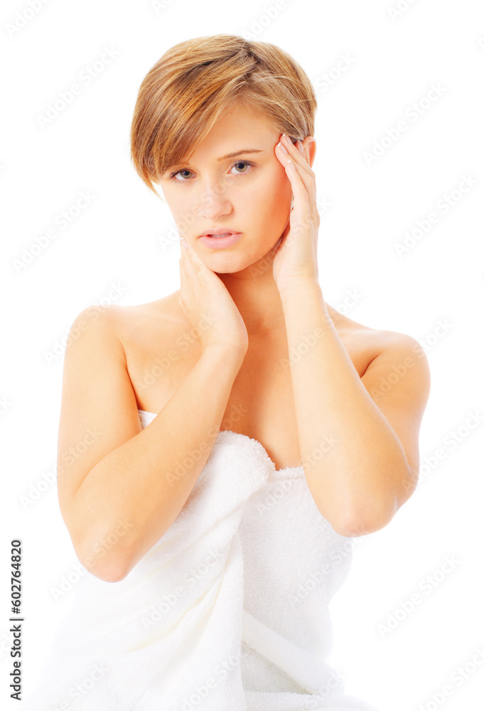 Beautiful woman in a towl touching her face, from a complete series of images. Beautiful woman in a towl touching her face, from a complete series of images.