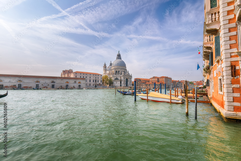 Fabulous morning cityscape of Venice with famous Canal Grande and Basilica di Santa Maria della Salute church.