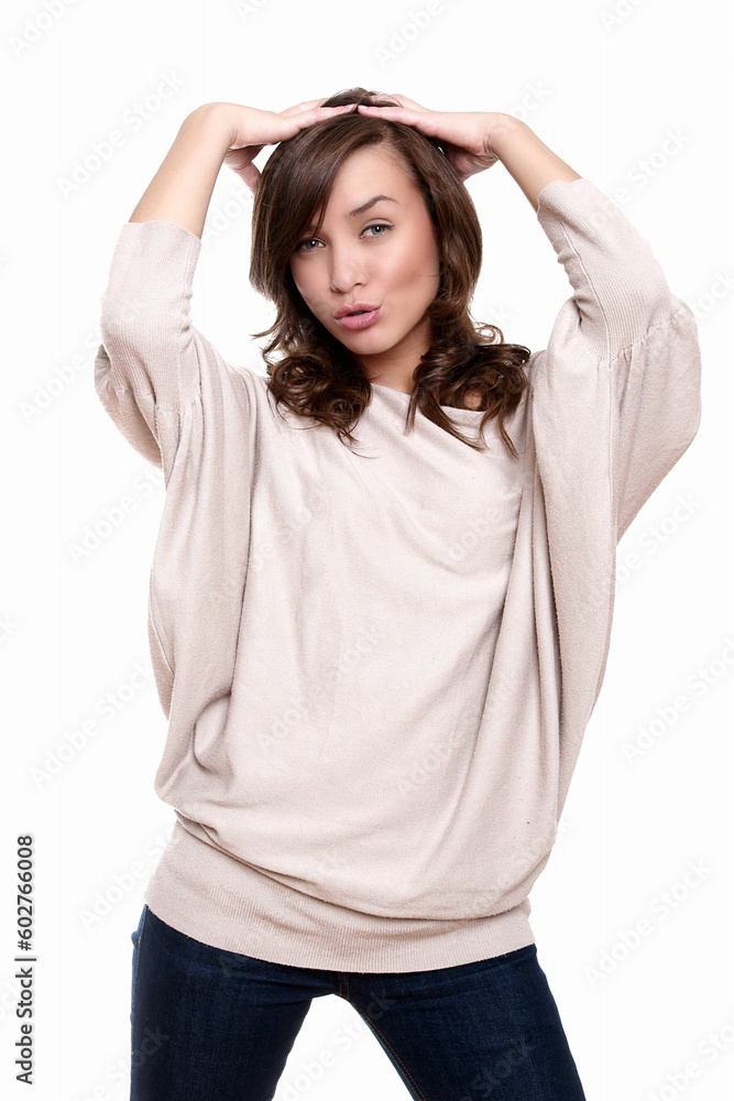Beautiful young adult girl posing in studio on white backround Beautiful young adult girl posing in studio on white backround