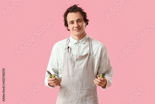 Male gardener with secateur...