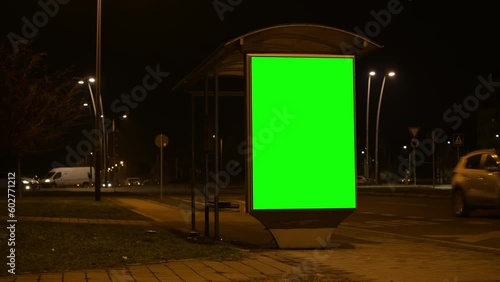 City street bus stop advertising billboard green screen mockup at night