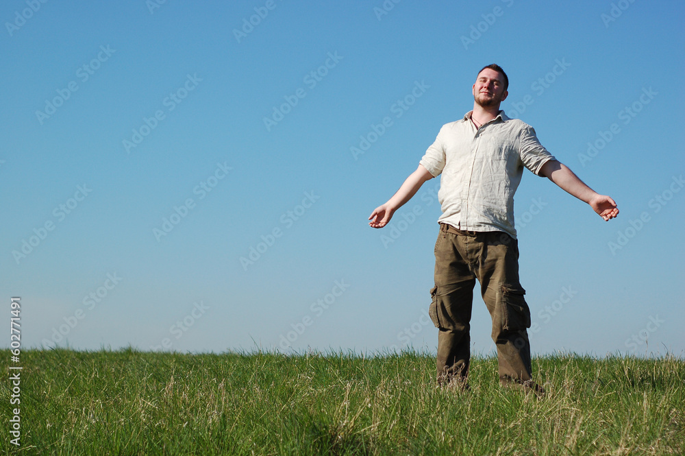 man on the green meadow