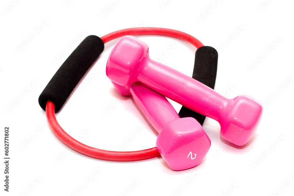 pink dumbbells with rubber for training on the white background