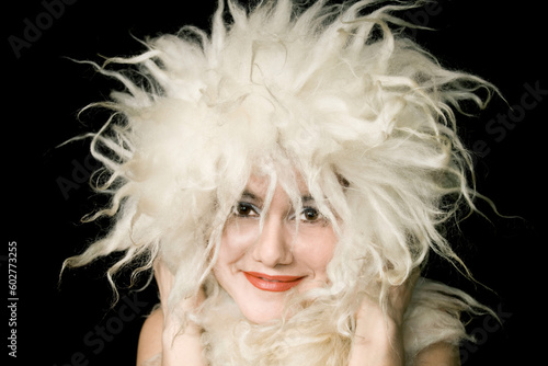 Fototapeta Naklejka Na Ścianę i Meble -  Excellent ridiculous woman on her head the white fur