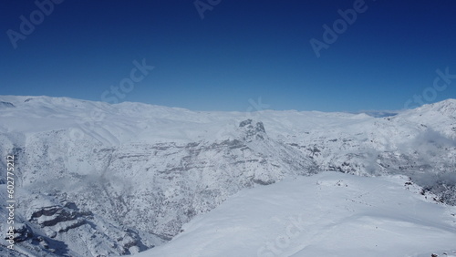 Fototapeta Naklejka Na Ścianę i Meble -  Visão aérea da estação de esqui de Farellones no Chile captada do alto por um drone em 2022. 