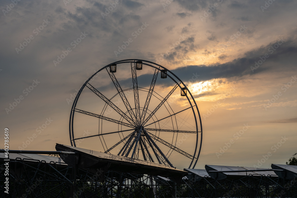 Lake Balaton in spring sunshine. view of Ferris wheel on Balaton beach