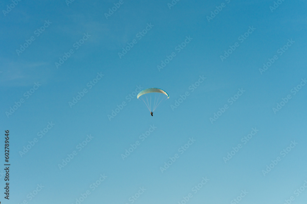 Paragliders on Mount Csobanc on a summer afternoon. Summer adrenaline-boosting sports Paragliders on Mount Csobanc on a summer afternoon. Summer adrenaline-boosting sports