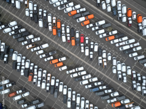 Car parking at the port. Delivery of cars by ship	