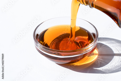 Pouring Maple Syrup in a Bowl