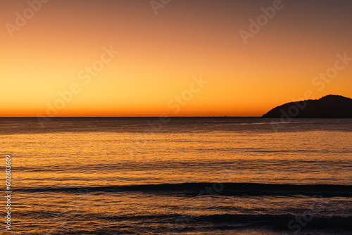 Vibrant sunrise over the water at Jimmy's Beach, Hawks Nest NSW Australia