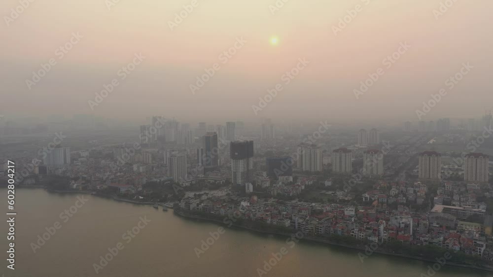 HANOI, VIETNAM - MAY, 2023: Aerial view of suburb area of Hanoi. Residential buildings from above. HANOI, VIETNAM - MAY, 2023: Aerial view of suburb area of Hanoi. Residential buildings from above.