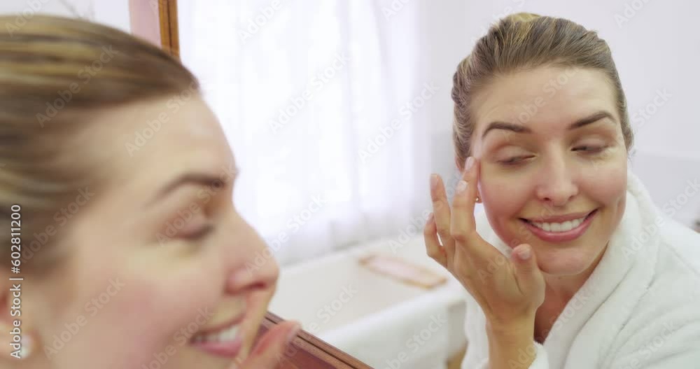 Mirror, skincare or happy woman with face cream product for beauty or natural moisturizing in home bathroom. Cosmetics, smile or beautiful girl with facial moisturizer or dermatology lotion for glow Mirror, skincare or happy woman with face cream product for beauty or natural moisturizing in home bathroom. Cosmetics, smile or beautiful girl with facial moisturizer or dermatology lotion for glow