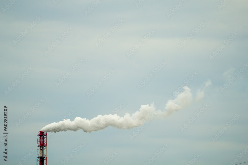 Chimney of chemical plant with thick smoke, industrial object