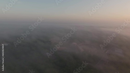 Aerial Drone View Yucatan Chichen Itza Mayan Pyramids Ruins at Sunrise Fog Mexico photo