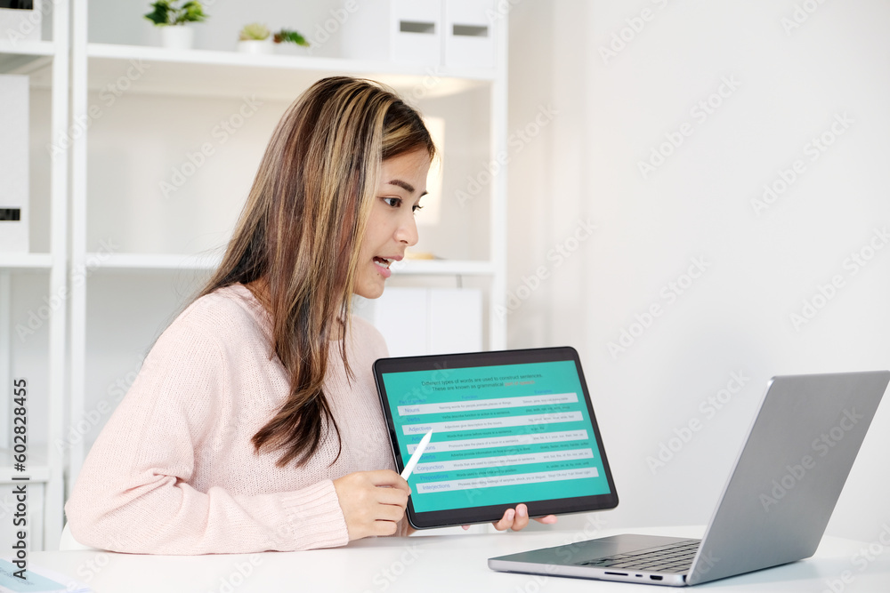 Woman study english language online by laptop computer, learning online course Woman study english language online by laptop computer, learning online course
