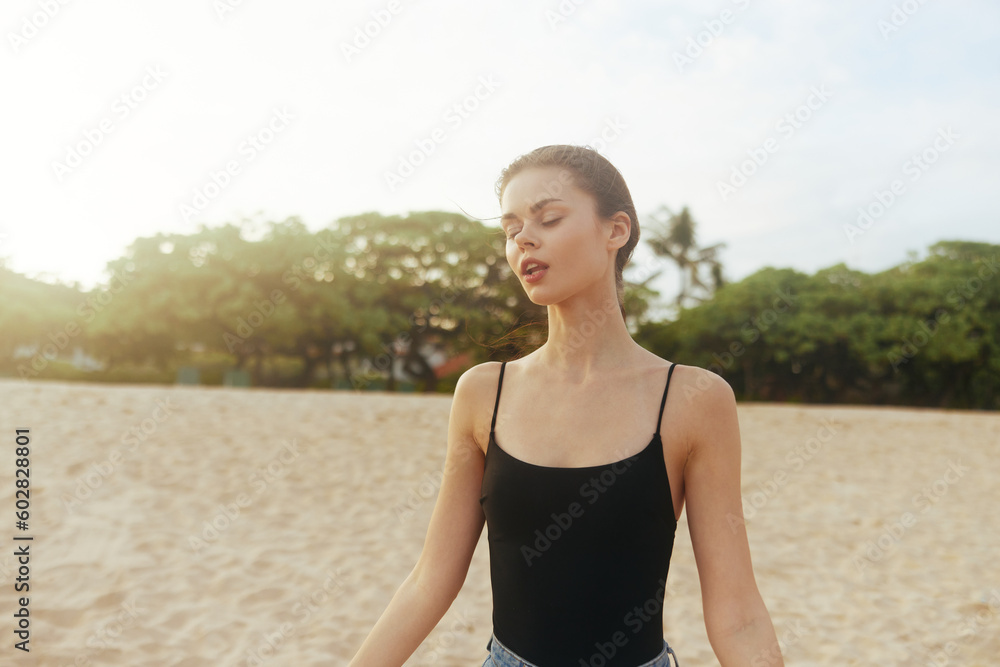 ocean woman lifestyle jean beach sand vacation summer sea smile sunset ocean woman lifestyle jean beach sand vacation summer sea smile sunset
