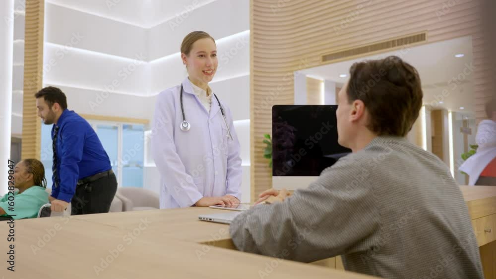 Caucasian doctor greeting each other at information counter in hospital. Caucasian doctor greeting each other at information counter in hospital.