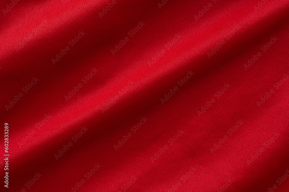 Red sports clothing fabric football shirt jersey texture background Red sports clothing fabric football shirt jersey texture background