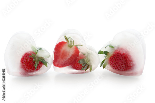 Fresh strawberry frozen in ice on white background