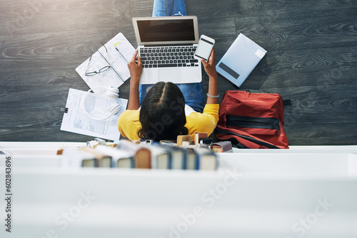 Student laptop, phone screen and top view woman typing research project, university paper or study for college exam. School library, floor and e learning person search online for education info photo