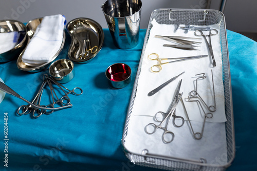 Sterilised surgical tools and equipment in trays in hospital operating theatre