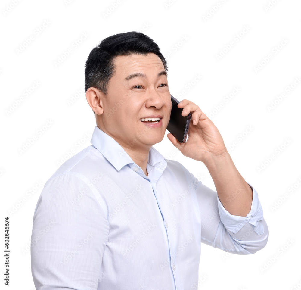Businessman in formal clothes talking on phone against white background Businessman in formal clothes talking on phone against white background