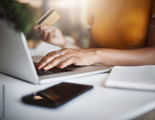 Hands, laptop and business woman with credit card for ecommerce, deal or discount in home office. Online shopping, payment and female person with debit, banking or budget planning and finance