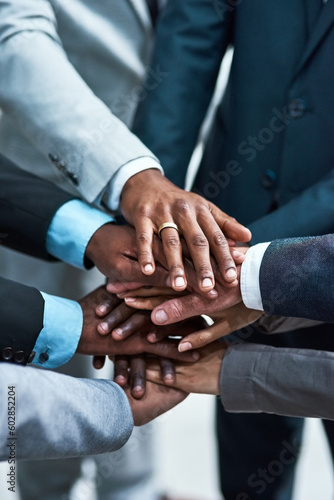 Hands together, business and group of people for support, target or teamwork, collaboration goals and diversity. Circle, diversity and corporate person or employees stacked sign, success and mission