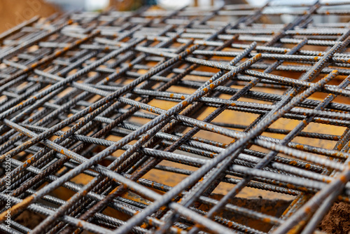Reinforcing mesh at the construction site. Reinforcing cages for foundations and grillages. Close-up. Melaconstructions in modern construction.