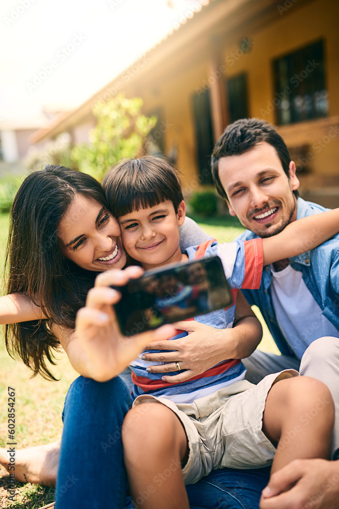Fototapeta premium Happy family, relax and smile for selfie, profile picture or photo in social media vlog outside home. Mother, father and child smiling for fun memory, online post or holiday weekend break together