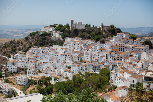Small town of white houses perched on a hillside in Casares Spain