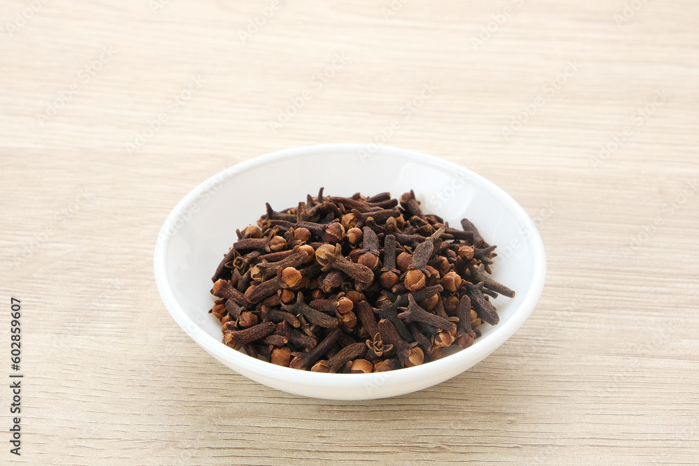 Dried cloves (cengkeh), dried herbs served in small bowl
Dried cloves (cengkeh), dried herbs served in small bowl