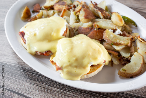 A view of a plate of eggs Benedict.