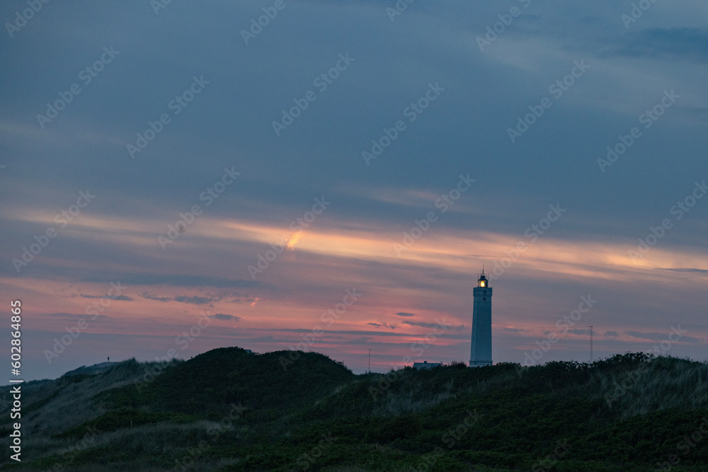 The western most point of Denmark-Blåvand lighthouse on Blåvandshuk with beach view on the west coast of Jutland, Blåvand is a town in Varde municipality in Jutland in Denmark