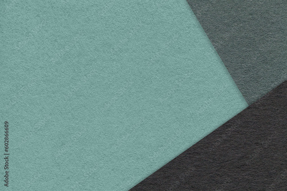 Texture of craft cyan color paper background with olive and black border. Vintage abstract green cardboard. Texture of craft cyan color paper background with olive and black border. Vintage abstract green cardboard.