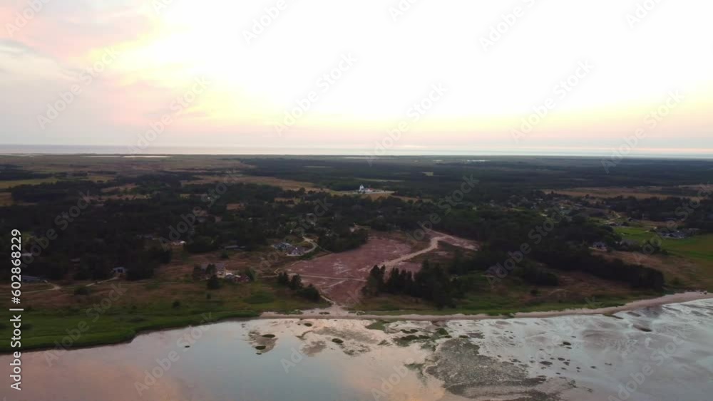 Aerial pan across mudflats and lowland forest with low water levels Aerial pan across mudflats and lowland forest with low water levels