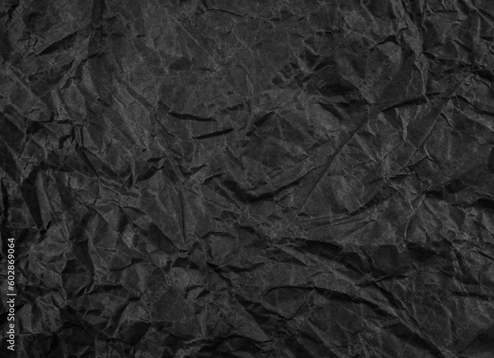 Black crumpled paper texture pattern. Rough grunge old blank. Black crumpled paper texture pattern. Rough grunge old blank.
