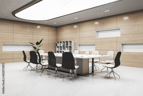 Modern conference room interior design with lighting ceiling, perspective view on huge meeting table with stylish chairs on light glossy floor and wooden wall background with decoration. 3D rendering