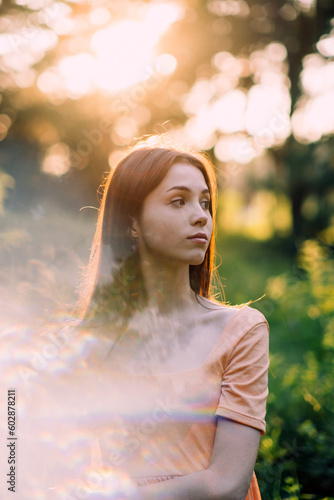 Holistic and Integrative Medicine. Mind-Body Therapies, relaxation techniques. Outdoor portrait of Young woman in nature background with reflection